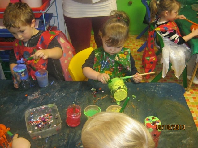 Children engrossed in activities at Noah's Ark.